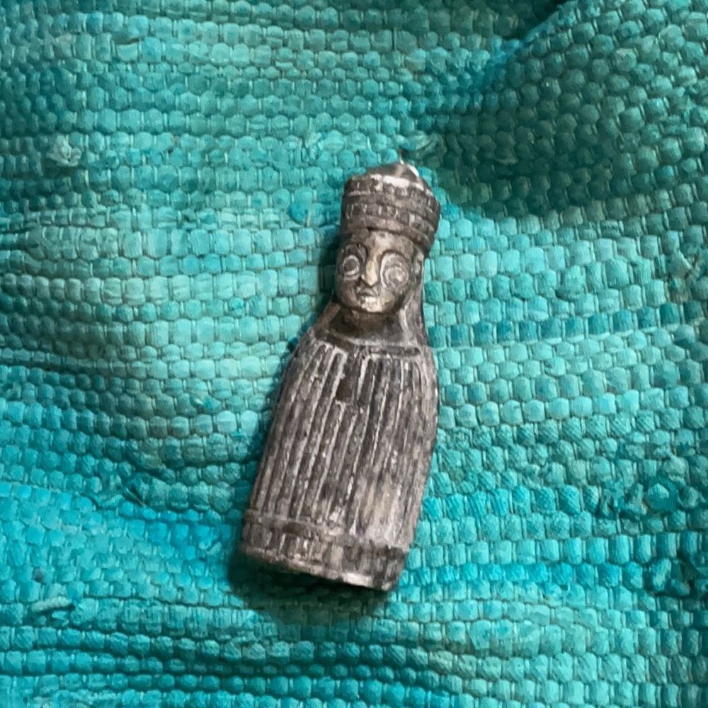 Stone carved statuette